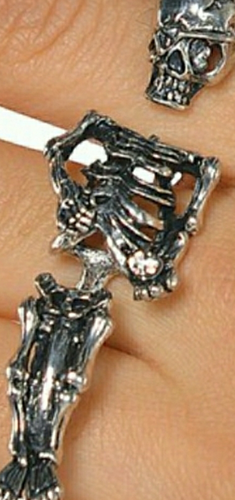 Three Finger Skull Ring.